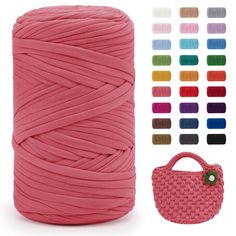 a spool of yarn next to a pink bag