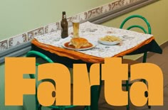 there is a table with food on it and the words fanta in front of it