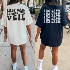 two women walking down the street wearing matching shirts and shorts that read dazed and engaged