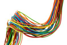 an assortment of multicolored wires against a white background