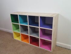 multicolored cubby storage unit against a white wall in a room with carpet