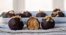 chocolate covered desserts are on a plate and ready to be eaten