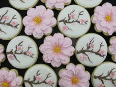 decorated cookies with pink flowers on them