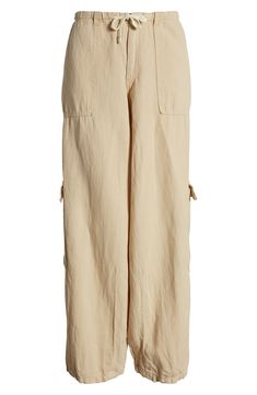 Elevate your casual wardrobe with these drawstring-waist cargo pants crafted from fresh, lightweight cotton in a baggy silhouette. 31 1/2" inseam; 17" leg opening; 10 1/2" front rise; 15 1/2" back rise (size Medium) Exclusive retailer Zip fly; drawstring waist Front slant pockets; cargo flap-patch pockets 100% cotton Machine wash, line dry Made in Turkey Beige Linen Cargo Bottoms, Casual Linen Parachute Pants With Cargo Pockets, Utility Linen Cargo Pants With Cargo Pockets, Khaki Linen Cargo Pants With Pockets, Wide-leg Linen Cargo Pants With Pockets, Wide-leg Linen Cargo Pants, Utility Linen Cargo Pants With Relaxed Fit, Wide Leg Linen Parachute Pants With Cargo Pockets, Spring Linen Cargo Pants With Pockets