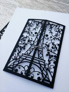 the eiffel tower is made out of metal and has an intricate design on it