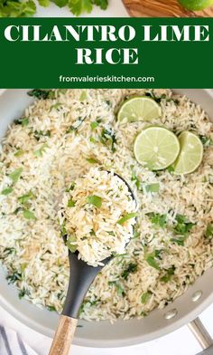 a white bowl filled with rice, limes and cilantro lime slices on top