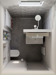 a bathroom with a sink, mirror and toilet in it's stall area is shown