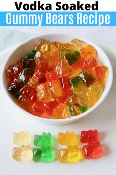 a bowl filled with gummy bears sitting on top of a white plate