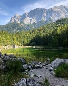 a mountain lake surrounded by trees and rocks