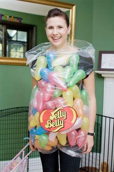 a woman holding a bag full of jelly beans