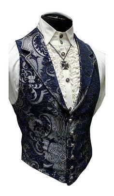 Cut from a rich blue tapestry fabric on the front, our waistcoat features a silver satin lining and back that ties with belting. To maintain the slim silhouette, no pockets clutter the look. Exterior front made from a blend of 55% viscose and 45% polyester, lining 100% polyester. | eBay! Victorian Vampire, Steampunk Clothing, Steampunk Fashion, Fantasy Fashion, Character Outfits, Gothic Fashion, Victorian Fashion, Character Concept, Heavy Metal