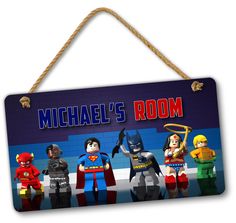 a sign that says michael's room with legos and batman characters on it