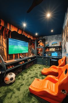 a sports themed kids'room with green carpet and orange slides