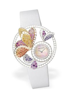 Boucheron Ajourée Bouquet d'Ailes jewelry watch with diamonds, multicolored sapphires and amethysts set in gold with mother-of-pearl dial. Amethyst Set, Timex Watches, Jewelry Watch, Amazing Watches, Stylish Watches, Beautiful Watches, Diamond Watch, Women's Watch