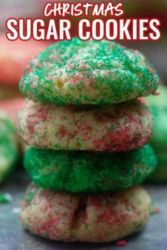 christmas sugar cookies stacked on top of each other with sprinkles in the middle