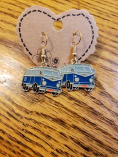 These earrings are made from goldtone materials. They have approx a 1 inch drop. Retro Bus, Rochester Ny, Jewelry Earrings Dangle, 1 Inch, Dangle Drop Earrings, Gold Tones, Dangle Earrings, Jewelry Earrings, Thing 1