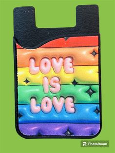 a bag with the words love is love painted on it's front and sides