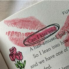 an open book with lipstick drawn on it and the words can i kiss you?