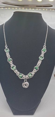 A custom made byzantine capture bead weave chainmaille necklace.  Beads are light green adventurine. Clasp is a delicate filigree push closure. Necklace measures 18" from clasp to clasp. Chainmaille Necklace, Necklace Beads, Bead Weaving, Light Green, Necklace Etsy, Custom Made, Beaded Necklace, Weaving, Jewelry Necklaces