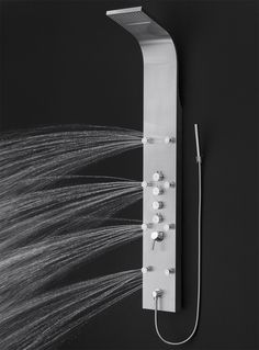 an overhead view of a shower head with water flowing from it