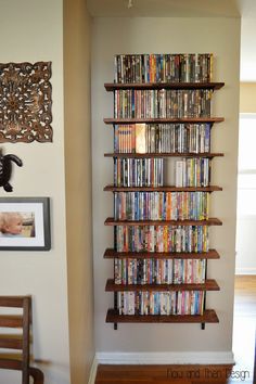 a book shelf filled with lots of dvds