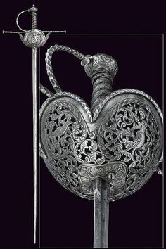 A chisselled cup-hilted sword, provenance: Italy dating: 17th Century. 19th Century, Clothing Accessories