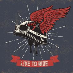 a motorcycle helmet with wings and the words live to ride