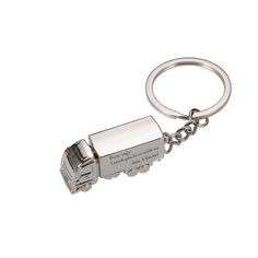 a metal key chain with a truck on it's side and a quote that says, this is the way to go