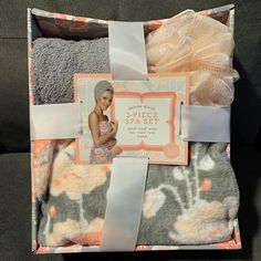 the spa gift set includes three pieces of towels