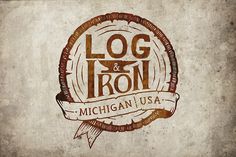 the logo for log and iron michigan usa is shown in brown on an old paper background