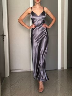 This silk satin slip dress can be worn as a bridesmaid dress, party and date dress and for many other occasions. Made of satin silk. DESCRİPTİON:  -Adjustable straps.  -Designed for a slim but relaxed fit.  -Unlined. İt is a custom made dress, tailored according to your preferences, you can choose the length of the dress and order it with cut on the front.  While ordering write your bust, waist and hips measure, so the dress will be made to your size. Please enquire if you're interested in different color. SIZING INFO: XS/34/US4: bust: 82-86cm (32-33 inch) waist 64-66 cm (24-25 inch)  S/36/ US6: bust: 86-88cm (33-34 inch) waist: 66-68 cm (25-26 inch) M/38/ US8: bust: 88-92 cm (34-36 inch) waist: 68-72 cm (26-28 inch) L/40/ US10:  bust: 92-94 cm (36-37 inch) waist: 72-74 cm (28-29 inch) WAS Satin V Neck Dress, Dark Grey Satin Dress, Elegant Fitted Satin Suspender Dress, Fitted Satin Wedding Dress With Spaghetti Straps, Elegant Party Slip Dress With Adjustable Straps, Fitted Slip Dress With Adjustable Straps For Bridesmaids, Wedding Slip Dress With Satin Finish And Spaghetti Straps, Elegant Prom Slip Dress With Adjustable Straps, Elegant Satin Dress With Adjustable Straps