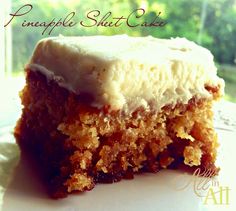 a piece of cake sitting on top of a white plate next to a glass window