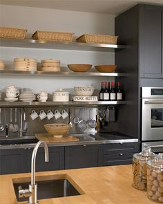 the kitchen is clean and ready to be used for cooking, baking, or eating