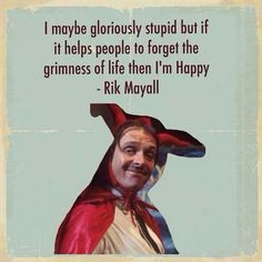 a man in a red cape with a quote from rick mayll on his face