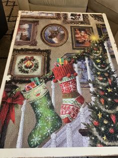 a christmas stocking and stockings jigsaw puzzle is displayed on a coffee table