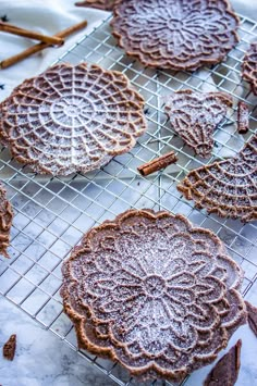 some cookies are cooling on a wire rack