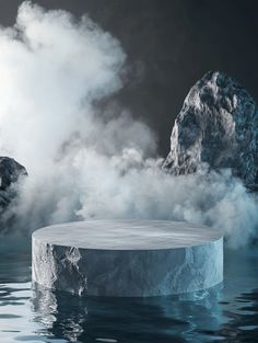 an iceberg floating in the water with steam coming out of it's sides