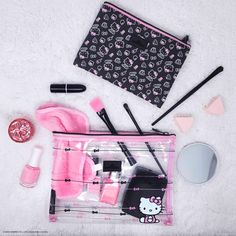 Carry Hello Kitty's favorites and your essentials with ease using the Hello Kitty® Slim Pouch set. Featuring our exclusive Hello Kitty® prints, this set is thoughtfully crafted to accommodate all your necessities on the go. Use the clear, larger pouch for bulky items and the smaller pouch for your daily makeup! Hello Kitty Prints, Impressions Vanity, Hello Kitty Images, Nest Design, Small Case, Large Pouch, Bow Pattern, Hello Kitty Collection, Daily Makeup