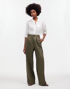 Made of a drapey TENCEL™ lyocell and linen blend, these wide-leg pants have sailor-inspired button tabs at the waist.Full-length inseam that hits right above the ground when worn with heels.12 3/4' rise, 23' leg opening, 30' inseam. Petite inseam: 27 1/2'; tall inseam: 33'.48% TENCEL™ lyocell/33% cotton/19% linen.Do Well: TENCEL™ lyocell fibers are derived from sustainable wood sources in a closed-loop process; for each piece made at the Fair Trade Certified™ factory, we Khaki Trousers, Street Style Winter, Madewell Denim, Straight Leg Trousers, Knit Midi Dress, Wide Leg Trousers, Straight Leg Pants, World Of Fashion, Fashion Online Shop