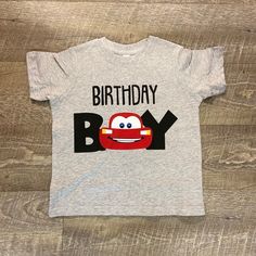 Lightning McQueen Birthday Boy This item is for (1) grey tshirt with black and red vinyl lettering on front.  Available Sizes 2T 3T 4T I handmake each tshirt, no two will be exactly the same, please allow 3-7 days for production. Please email me with any questions.  Want to see more, check us out on Facebook at http://www.facebook.com/williamandwesley Thank you for shopping! Lightening Mcqueen 3rd Bday, Boy 2nd Birthday Party Ideas, Birthday Cars Theme, 2 Year Birthday Theme Boy, 4th Birthday Party For Boys, Lightning Mcqueen Birthday, Mcqueen Birthday, Flash Mcqueen, 2nd Birthday Party For Boys