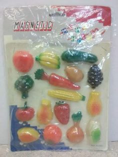 plastic fruit and vegetable magnets are on the package for use in crafts or home decor