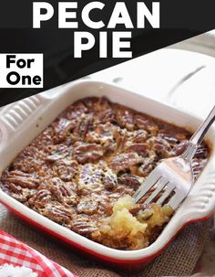 a casserole dish with pecan pie in it on a red and white checkered table cloth