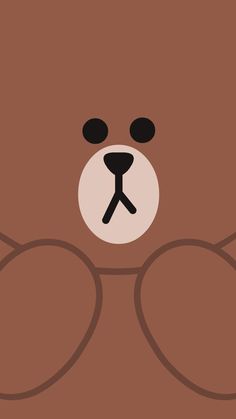 a brown teddy bear with black eyes and nose