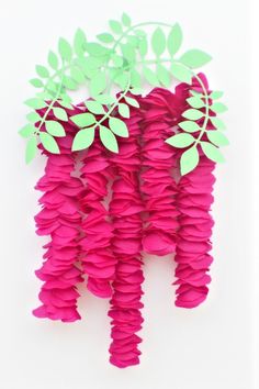 Need an easy idea for hanging paper flowers? A wisteria home decor is the perfect romantic touch! And this artificial wisteria wall hanging looks fabulous, is inexpensive and so easy to make! Paper Wisteria, Wisteria Wall, Hanging Paper Flowers, Making Flowers, Easy Paper Flowers, Leaf Template, Crepe Paper Flowers, Paper Flowers Craft, Tissue Paper Flowers