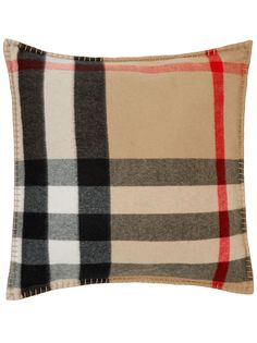 a burluck plaid pillow on a white background