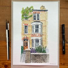 a watercolor painting of a yellow brick house