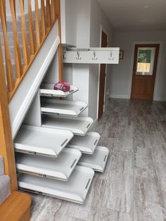 the stairs in this house are full of storage