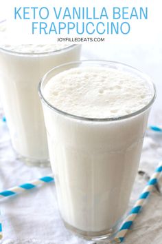 two glasses of keto vanilla bean frappuccino on a table with blue and white striped straws