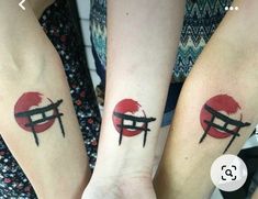 two people with matching tattoos on their arms