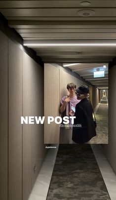 two people are standing in an empty hallway with the words new post written on it